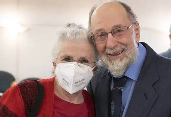 Man and woman wearing mask